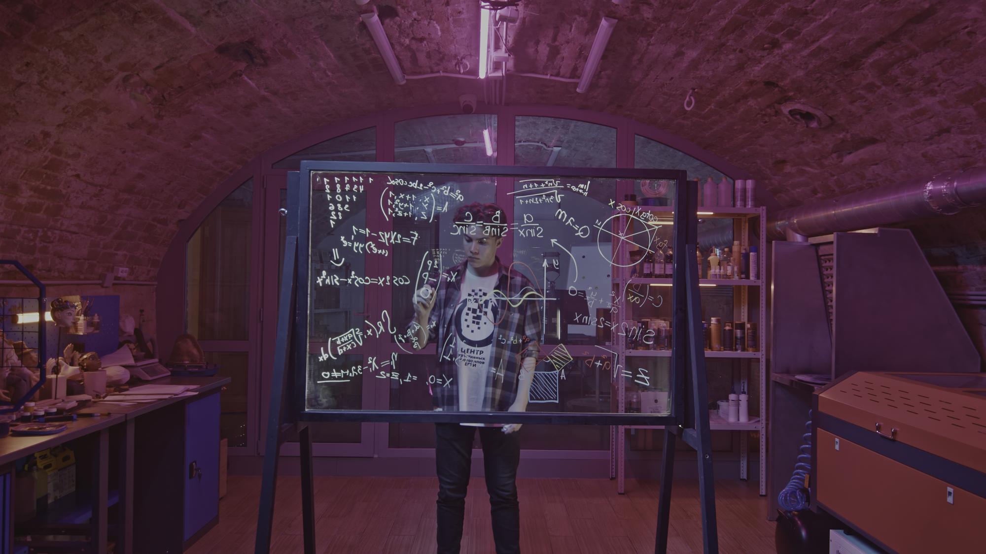 exterior of the embroidery studio with neon sign