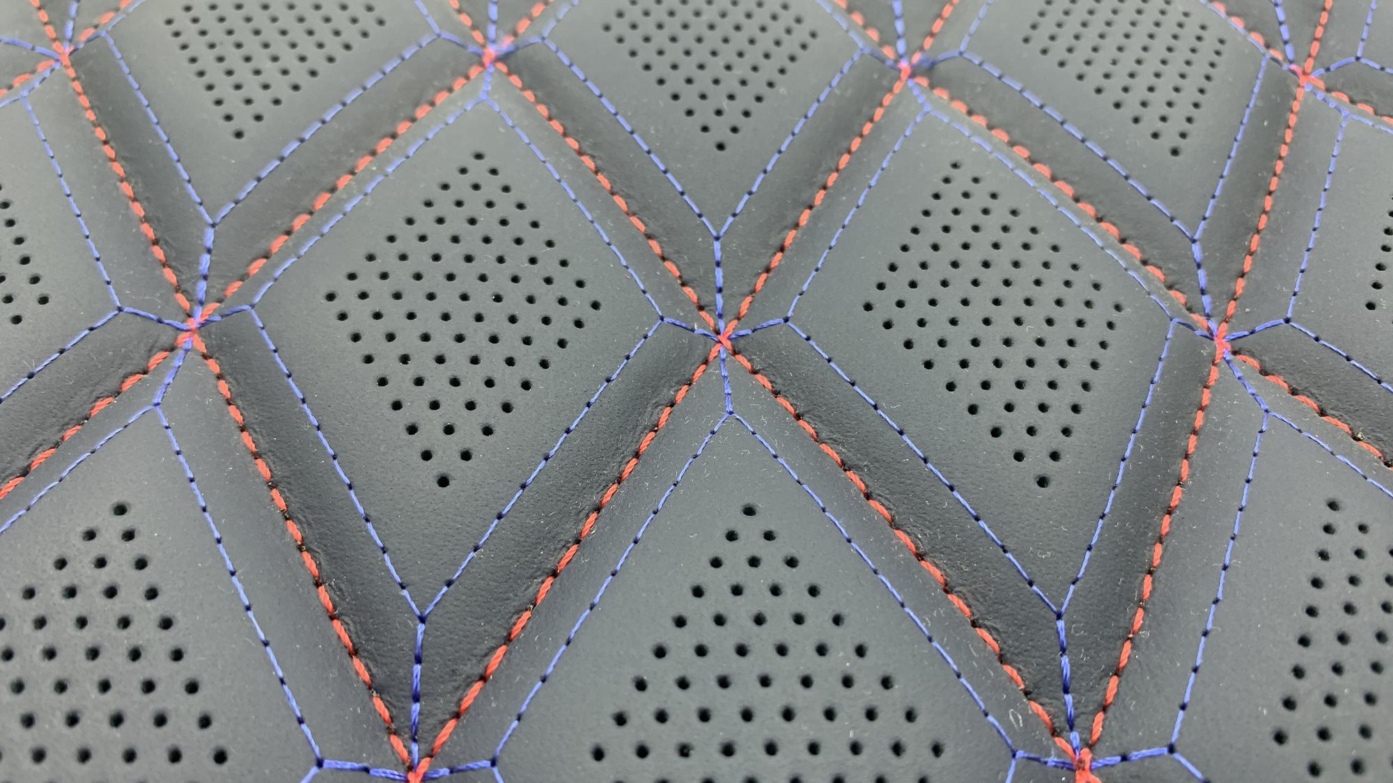 small embroidered panel with metallic thread